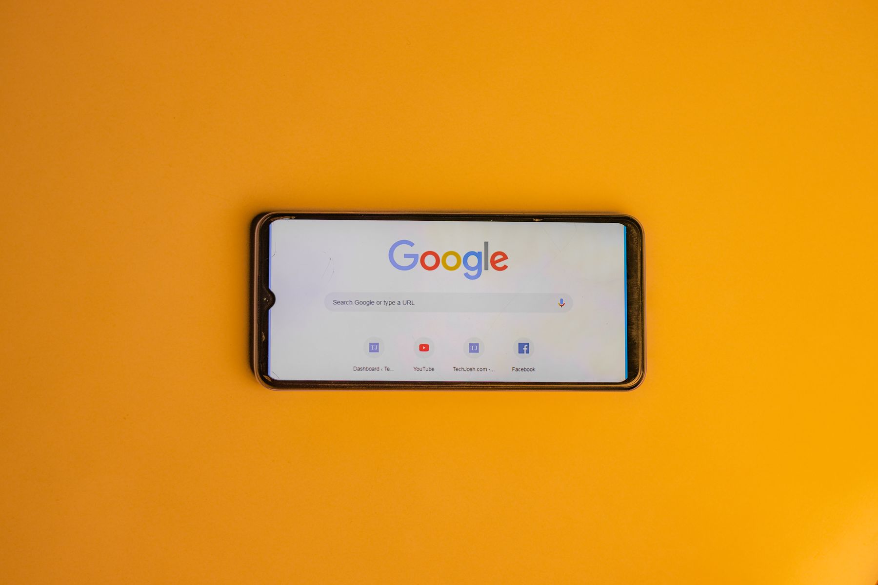 Customer using a phone to find a local business through SEO growth plans